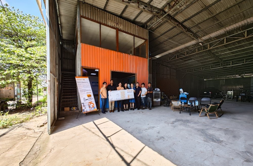 Team and technical schematics at the lab entrance facility