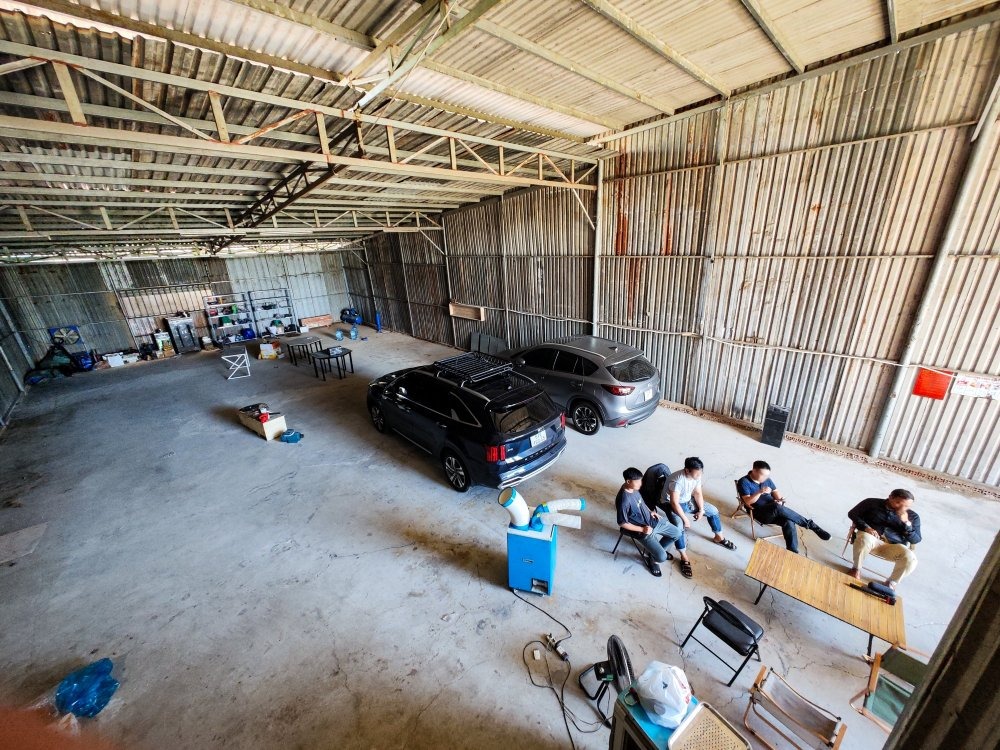 Overhead wide-angle view of the R&D warehouse space and team workspace