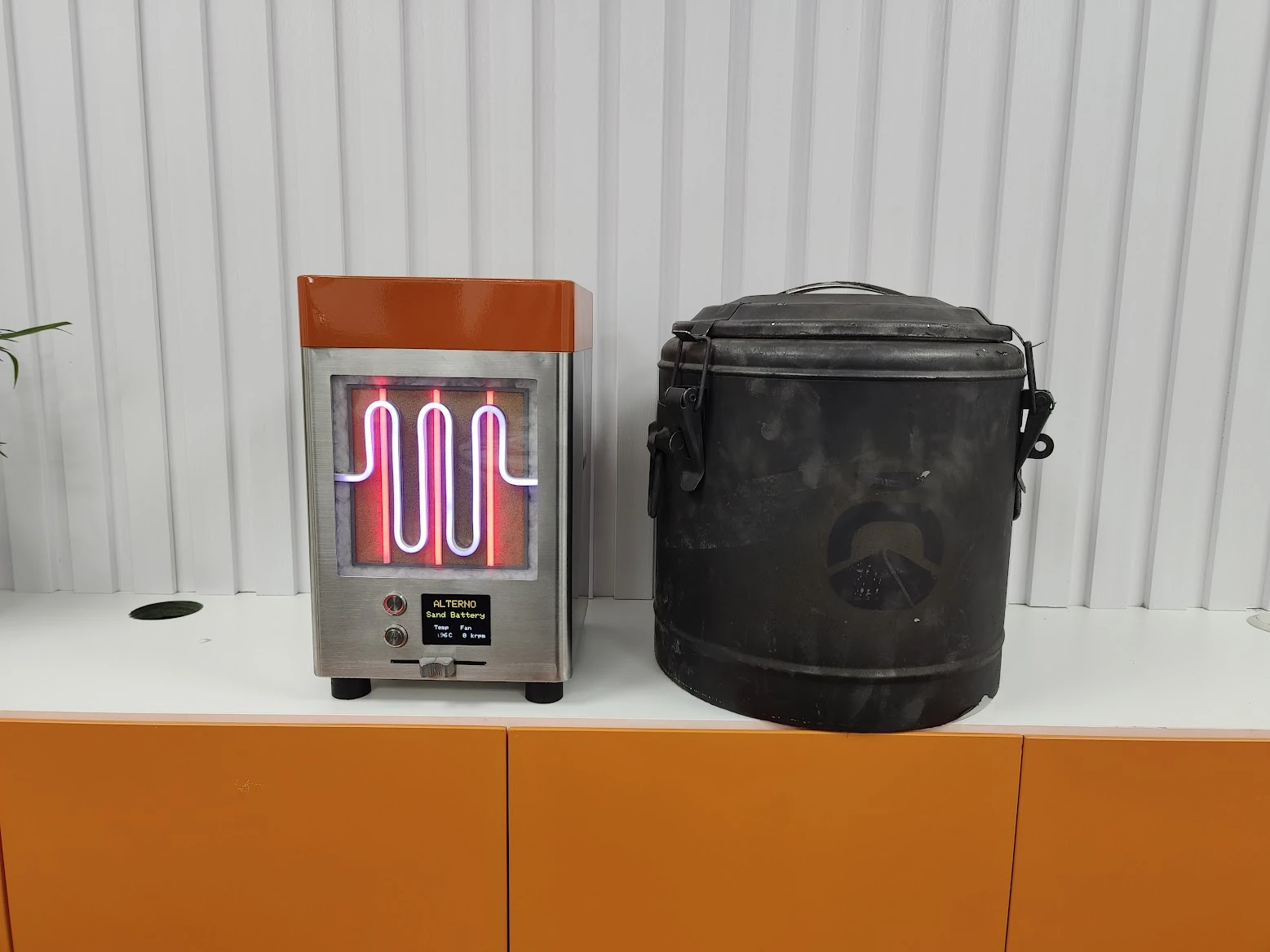 The original Sand Battery that made it out (right) and the one that did not